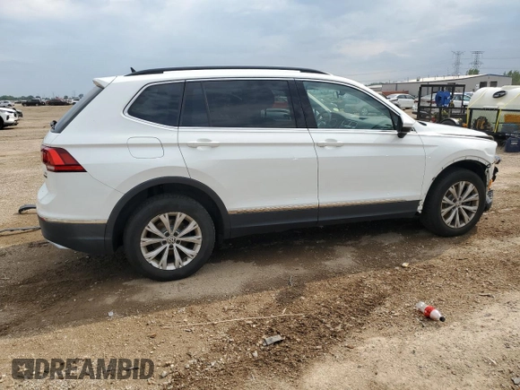 2018 Volkswagen Tiguan SEL with VIN 3VV2B7AX5JM161449, listed as a Copart auction lot 59318875 with 73,343 mi miles and Salvage title. Bid and sale history available at DreamBid. Image 3.