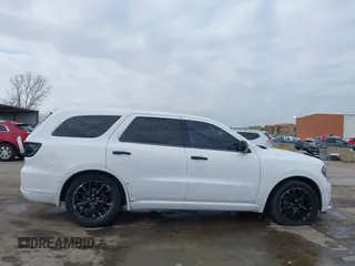 2015 Dodge Durango SXT with VIN 1C4RDHAG0FC793443, listed as a IAAI auction lot 41376184 with 113,123 mi miles and . Bid and sale history available at DreamBid. Image 14.