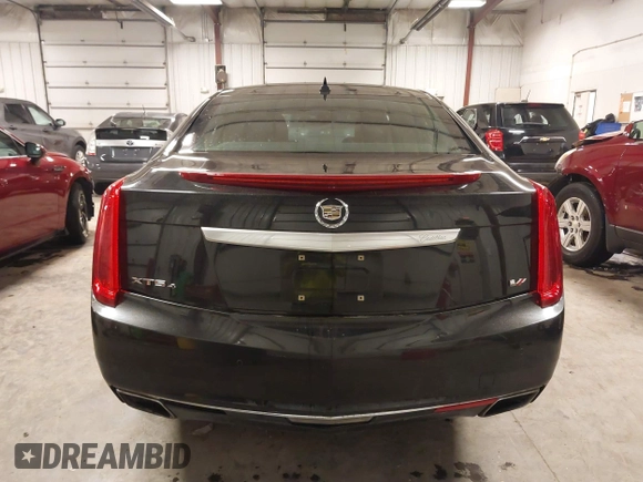 2014 Cadillac XTS Platinum with VIN 2G61W5S88E9186969, listed as a IAAI auction lot 41422872 with 184,998 mi miles and . Bid and sale history available at DreamBid. Image 16.