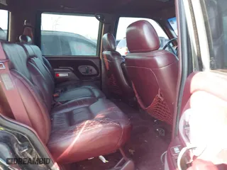 1996 Chevrolet Tahoe with VIN 1GNEK13RXTJ418622, listed as a IAAI auction lot 41879760 with 349,211 mi miles. Bid and sale history available at carsss.com. Image 8.