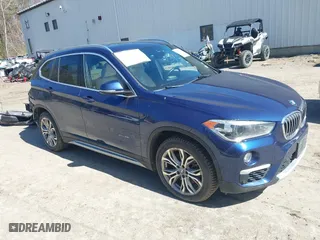 2017 BMW X1 xDrive28i with VIN WBXHT3C33H5F82035, listed as a IAAI auction lot 41944399 with 102,942 mi miles. Bid and sale history available at carsss.com. Image 1.