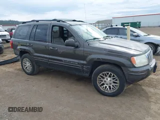 2004 Jeep Grand Cherokee Limited with VIN 1J4GW58N54C372118, listed as a IAAI auction lot 42526424 with 187,430 mi miles and . Bid and sale history available at DreamBid. Image 1.