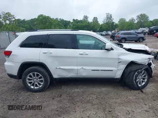 2021 Jeep Grand Cherokee Laredo E with VIN 1C4RJFAG7MC620710, listed as a IAAI auction lot 42255694 with 51,989 mi miles and . Bid and sale history available at DreamBid. Image 14.