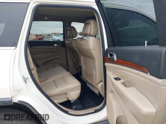 2012 Jeep Grand Cherokee Limited with VIN 1C4RJEBG4CC229571, listed as a IAAI auction lot 41565669 with 221,268 mi miles. Bid and sale history available at carsss.com. Image 8.