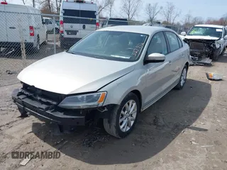 2011 Volkswagen Jetta Sedan SE w/Convenience & Sunroof PZEV with VIN 3VWDZ7AJXBM327932, listed as a IAAI auction lot 41950996 with 249,763 mi miles. Bid and sale history available at carsss.com. Image 2.