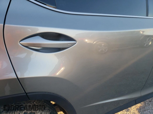2021 Lexus RX 350L z VIN JTJHZKEA0M2019757, wystawiony jako Copart lot #71006144 z przebiegiem Nie podano mil oraz Szkoda całkowita • Salvage title. Historia ofert i sprzedaży dostępna na DreamBid. Obrazek 11.