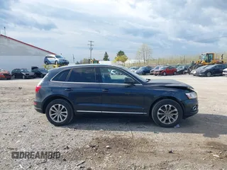 2014 Audi Q5 Premium Plus with VIN WA1LFAFP1EA114946, listed as a IAAI auction lot 42042556 with 190,787 mi miles. Bid and sale history available at carsss.com. Image 13.