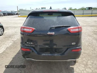 2018 Jeep Cherokee Overland with VIN 1C4PJMJX5JD525872, listed as a Copart auction lot 53783655 with 112,396 mi miles and Salvage title. Bid and sale history available at DreamBid. Image 6.