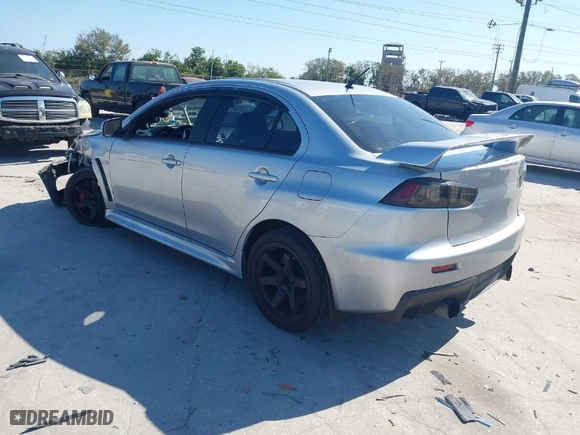 2013 Mitsubishi Lancer Evolution MR with VIN JA32W5FV6DU013470, listed as a IAAI auction lot 41544077 with 124262 miles. Bid and sale history available at carsss.com. Image 3.