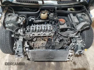 2003 MINI Hardtop S with VIN WMWRE33443TD68483, listed as a Copart auction lot 48637035 with 115,907 mi miles and Clean Title. Bid and sale history available at DreamBid. Image 11.