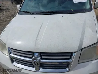 2010 Dodge Grand Caravan SXT with VIN 2D4RN5D12AR120322, listed as a IAAI auction lot 41876293 with 1 mi miles. Bid and sale history available at carsss.com. Image 10.