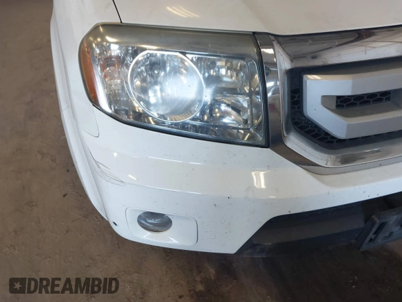 2010 Honda Pilot Touring with VIN 5FNYF4H95AB019903, listed as a IAAI auction lot 42196082 with 233,527 mi miles and . Bid and sale history available at carsss.com. Image 6.