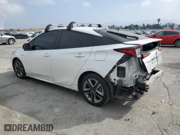 2021 Toyota Prius L Eco with VIN JTDKAMFUXM3149396, listed as a Copart auction lot 61874195 with 126,473 mi miles and Salvage title. Bid and sale history available at DreamBid. Image 2.