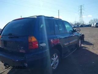 2003 GMC Envoy SLT with VIN 1GKDT13S732268164, listed as a IAAI auction lot 41863800 with 100,702 mi miles. Bid and sale history available at carsss.com. Image 4.