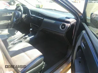 2017 Toyota Corolla L z VIN 2T1BURHE3HC813738, wystawiony jako IAAI lot #37140043 z przebiegiem 240 652 mil mil oraz . Historia ofert i sprzedaży dostępna na DreamBid. Obrazek 5.