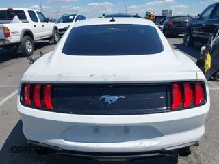 2021 Ford Mustang EcoBoost with VIN 1FA6P8TH4M5148415, listed as a IAAI auction lot 41945395 with 51,599 mi miles and . Bid and sale history available at DreamBid. Image 16.