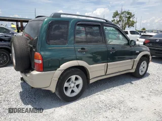 2002 Suzuki Grand Vitara JS z VIN JS3TE62V924151538, wystawiony jako Copart lot #58900085 z przebiegiem 130 514 mil mil oraz Szkoda całkowita • Salvage title. Historia ofert i sprzedaży dostępna na DreamBid. Obrazek 3.