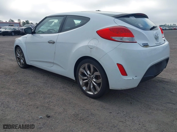 2014 Hyundai Veloster with VIN KMHTC6ADXEU213073, listed as a IAAI auction lot 41551346 with 130,549 mi miles. Bid and sale history available at carsss.com. Image 3.
