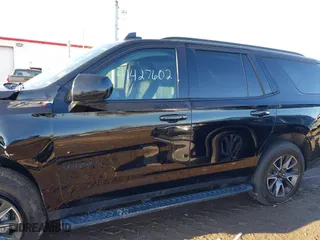 2021 Chevrolet Tahoe Z71 with VIN 1GNSKPKD1MR460353, listed as a IAAI auction lot 41427602 with 56,635 mi miles. Bid and sale history available at carsss.com. Image 13.