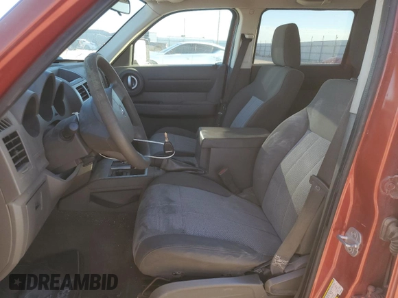2007 Dodge Nitro SXT with VIN 1D8GU28K87W728744, listed as a Copart auction lot 77082954 with 245,632 mi miles and Salvage title. Bid and sale history available at DreamBid. Image 7.