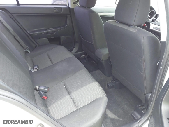 2012 Mitsubishi Lancer ES with VIN JA32U2FU5CU029556, listed as a IAAI auction lot 42104297 with 111,821 mi miles. Bid and sale history available at carsss.com. Image 8.