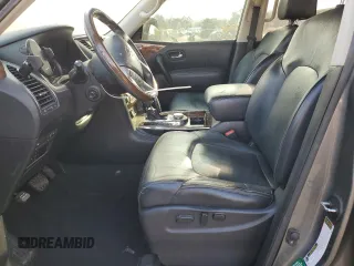 2016 Infiniti QX80 with VIN JN8AZ2NE4G9126706, listed as a Copart auction lot 48589555 with 151,940 mi miles and Salvage Title. Bid and sale history available at DreamBid. Image 7.