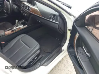 2015 BMW 3 Series 328i with VIN WBA3A5C50FF608327, listed as a IAAI auction lot 42136156 with 213,945 mi miles. Bid and sale history available at carsss.com. Image 5.