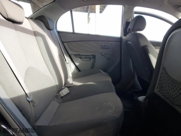 2010 Kia Rio LX with VIN KNADH4A34A6682936, listed as a Copart auction lot 82431724 with 84,528 mi miles and Salvage Title. Bid and sale history available at carsss.com. Image 11.