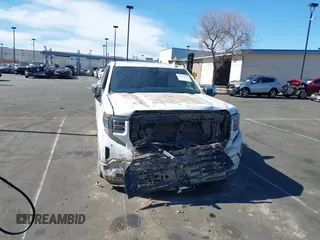 2022 GMC Sierra 1500 with VIN 3GTUUGETXNG640009, listed as a IAAI auction lot 41626847 with 43,537 mi miles and . Bid and sale history available at DreamBid. Image 6.