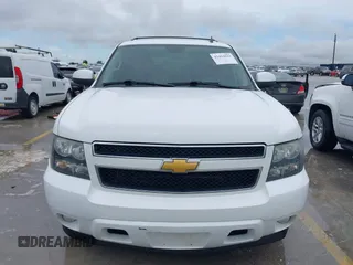 2012 Chevrolet Suburban LT with VIN 1GNSCJE00CR165813, listed as a IAAI auction lot 42494042 with 205,998 mi miles and . Bid and sale history available at DreamBid. Image 12.