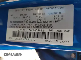 2012 Mazda 3 i Touring with VIN JM1BL1L7XC1653822, listed as a IAAI auction lot 42092300 with 90,995 mi miles and . Bid and sale history available at DreamBid. Image 9.