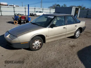 1995 Saturn SL with VIN 1G8ZH5288SZ350078, listed as a Copart auction lot 49236475 with 54,621 mi miles and Salvage Title. Bid and sale history available at carsss.com. Image 1.