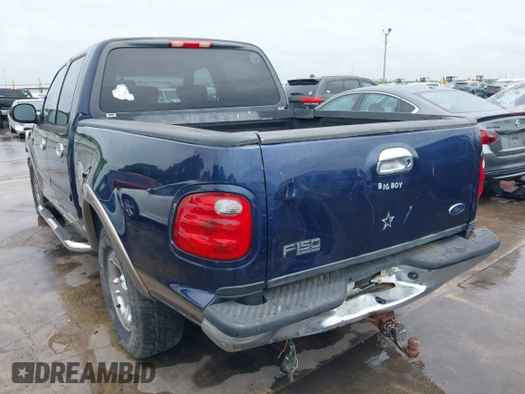 2003 Ford F-150 XLT with VIN 1FTRW07L33KC83234, listed as a IAAI auction lot 41894573 with 215,232 mi miles. Bid and sale history available at carsss.com. Image 3.