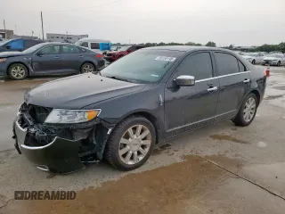 2010 Lincoln MKZ z VIN 3LNHL2GC4AR640442, wystawiony jako Copart lot #56158195 z przebiegiem 206 955 mil mil oraz Szkoda całkowita • Salvage title. Historia ofert i sprzedaży dostępna na DreamBid. Obrazek 1.