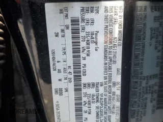 2014 Ford Focus Titanium with VIN 1FADP3J20EL347435, listed as a Copart auction lot 54947345 with 144,169 mi miles and Salvage title. Bid and sale history available at DreamBid. Image 12.