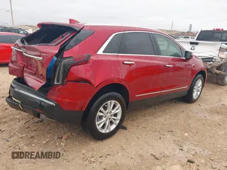 2023 Cadillac XT5 FWD Luxury z VIN 1GYKNAR42PZ147121, wystawiony jako IAAI lot #41315848 z przebiegiem 10 444 mil mil oraz . Historia ofert i sprzedaży dostępna na DreamBid. Obrazek 4.