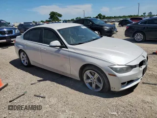 2015 BMW 3 Series 320i with VIN WBA3B1C5XFP831703, listed as a Copart auction lot 57561155 with 135,034 mi miles and Salvage title. Bid and sale history available at DreamBid. Image 4.