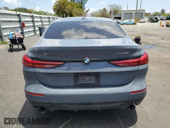 2021 BMW 2 Series 228i xDrive with VIN WBA73AK0XM7G32333, listed as a Copart auction lot 53720295 with 55,472 mi miles and Salvage title. Bid and sale history available at DreamBid. Image 6.