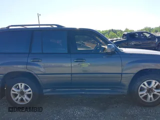 2003 Lexus LX with VIN JTJHT00W233532297, listed as a IAAI auction lot 42189676 with 235,992 mi miles. Bid and sale history available at carsss.com. Image 13.