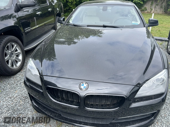 2012 BMW 6 Series 650i xDrive with VIN WBALX5C54CC894131, listed as a IAAI auction lot 42165498 with 82,800 mi miles. Bid and sale history available at carsss.com. Image 6.