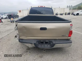 2004 Toyota Tundra SR5 with VIN 5TBET34104S461759, listed as a Copart auction lot 54163485 with 183,671 mi miles and Salvage Title. Bid and sale history available at DreamBid. Image 6.