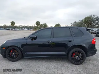 2009 Porsche Cayenne GTS with VIN WP1AD29P99LA62818, listed as a IAAI auction lot 41627073 with 166,414 mi miles. Bid and sale history available at carsss.com. Image 14.