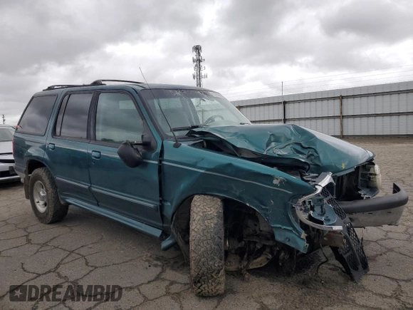 1998 Ford Explorer XL with VIN 1FMZU34E8WZB07364, listed as a Copart auction lot 51261845 with 98,429 mi miles and Salvage title. Bid and sale history available at DreamBid. Image 4.