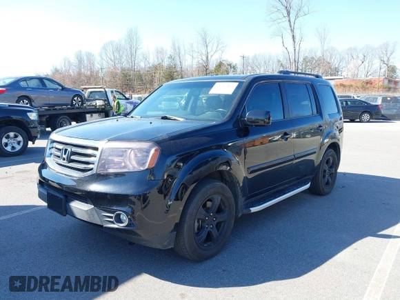 2014 Honda Pilot EX-L with VIN 5FNYF4H51EB025328, listed as a IAAI auction lot 41787439 with 169,313 mi miles and . Bid and sale history available at DreamBid. Image 2.