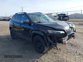 2020 Jeep Cherokee Trailhawk z VIN 1C4PJMBX5LD532516, wystawiony jako IAAI lot #41730502 z przebiegiem 85 543 mil mil oraz . Historia ofert i sprzedaży dostępna na DreamBid. Obrazek 1.