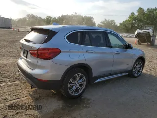 2016 BMW X1 xDrive28i with VIN WBXHT3Z34G4A49509, listed as a Copart auction lot 52992105 with 83,619 mi miles and Salvage Title. Bid and sale history available at carsss.com. Image 3.