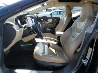 2016 Tesla Model S 90D with VIN 5YJSA1E20GF169954, listed as a Copart auction lot 61974475 with 124,560 mi miles and Salvage title. Bid and sale history available at DreamBid. Image 7.