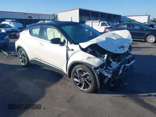 2021 Toyota C-HR LE with VIN JTNKHMBXXM1105546, listed as a IAAI auction lot 41486068 with 87,099 mi miles. Bid and sale history available at carsss.com. Image 1.