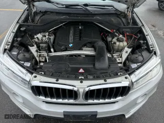 2016 BMW X5 xDrive35i with VIN 5UXKR0C56G0P30283, listed as a Copart auction lot 54527255 with 205,300 mi miles and Clean Title. Bid and sale history available at carsss.com. Image 7.