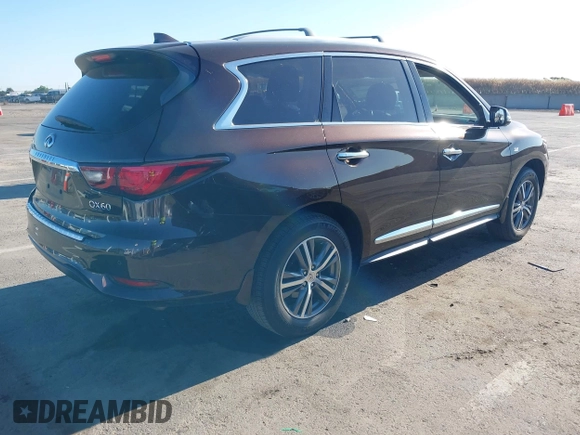 2019 Infiniti QX60 Pure with VIN 5N1DL0MM4KC569307, listed as a IAAI auction lot 42300605 with 40,336 mi miles and . Bid and sale history available at DreamBid. Image 4.